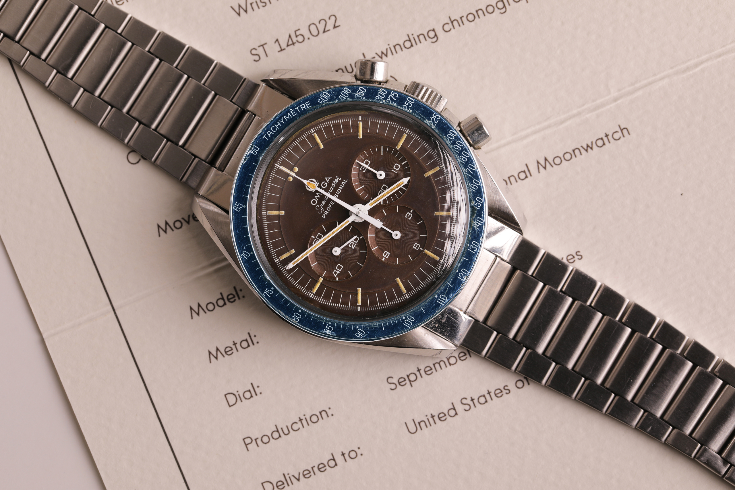 Omega Speedmaster Moonwatch ref. 145022 Tropical Inserto Blu 2 OMEGA brown blu 1